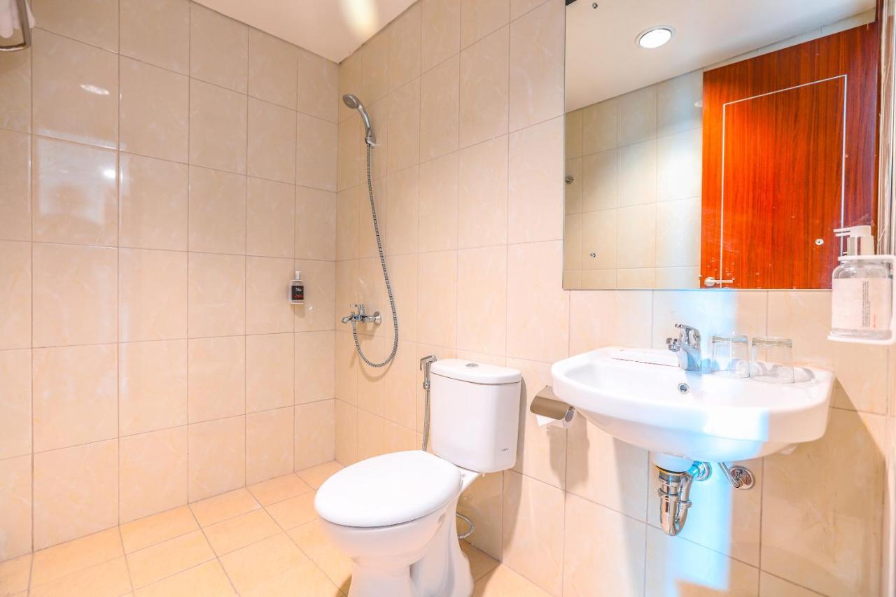 Super Oyo Collection O 16 Vittoria Residence Jakarta Extérieur photo